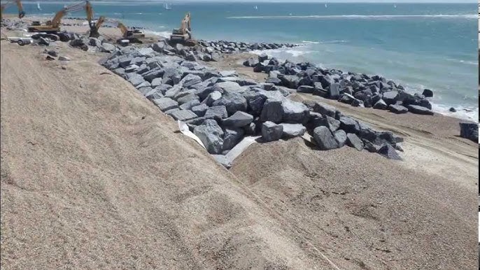Breakwater & Shore Protection Services 14 Installation of Rock Armor Revetment
